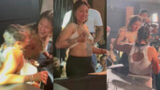 Tokischa bebiendo leche de una fanatica